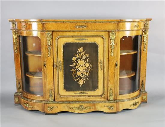 A Victorian marquetry inlaid ormolu mounted figured walnut credenza, W.5ft 8in. D.1ft 4in. H.3ft 7in.